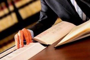 Attorney reading some books